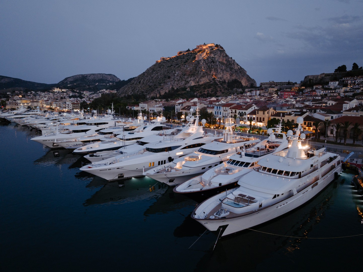 Aerial panoramic view of luxury yachts at the 2026 Mediterranean Yacht Show in Nafplio, Greece.